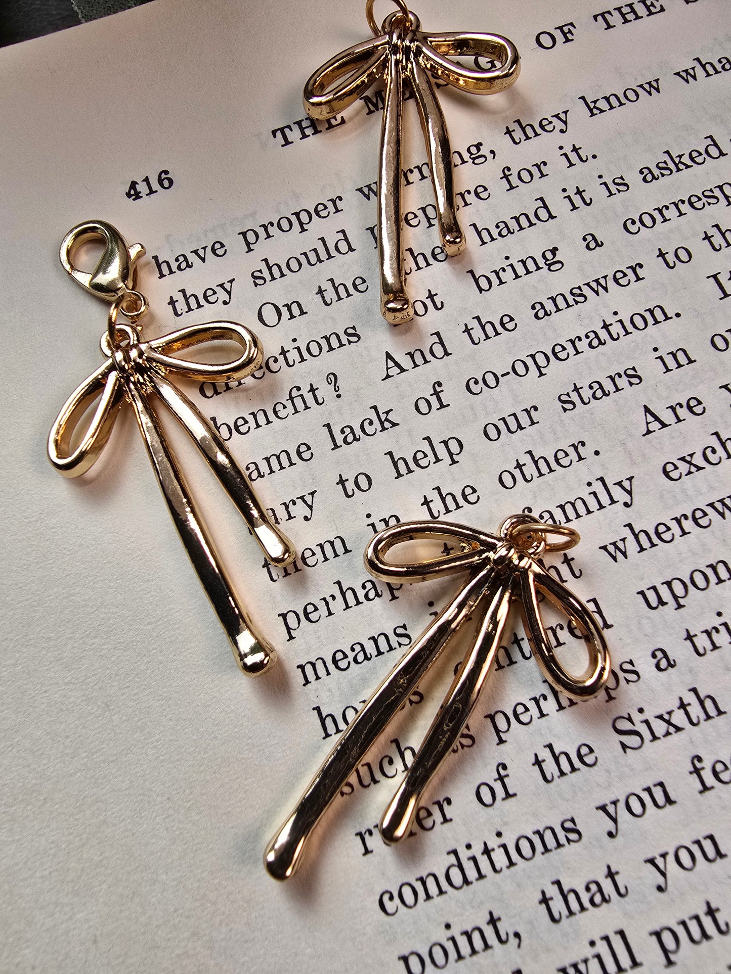 Dainty Gold Bow Charm | Sleek & Whimsical Jewelry Clip My Store