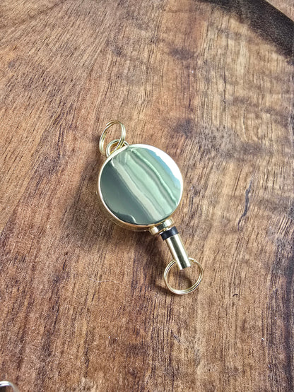 Mini Retractable Metal Badge Reel Sacred Sol Design