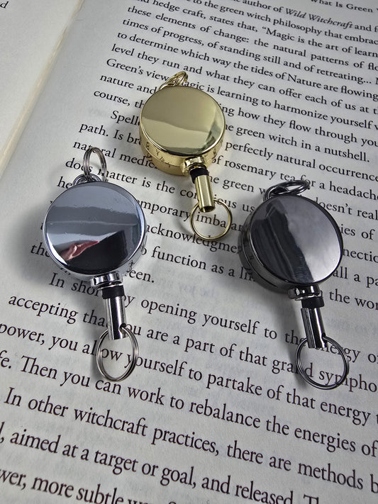 Mini Retractable Metal Badge Reel Sacred Sol Design