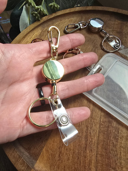 Clip-on Extendable Badge Reel Sacred Sol Design