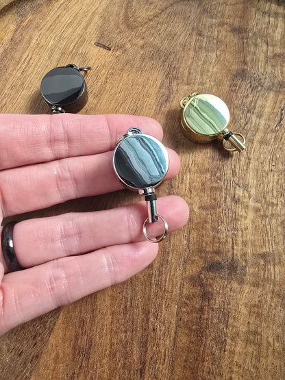 Mini Retractable Metal Badge Reel Sacred Sol Design